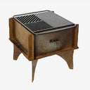 Gnistan griddle in hot-rolled steel with smooth and grate sides - side view